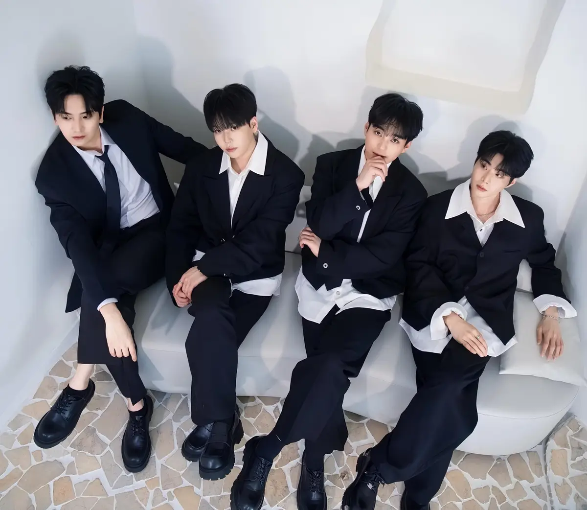 STC members are Donghyeon, Hyoya, Kangmin, and Sihyeon.